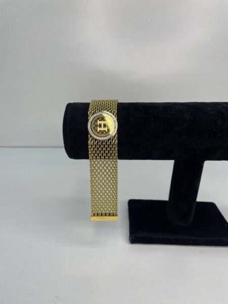 BRAZALETE DE ACERO DORADO