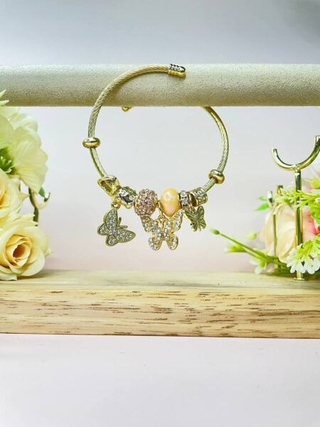 Pulsera Pandora con mariposas doradas