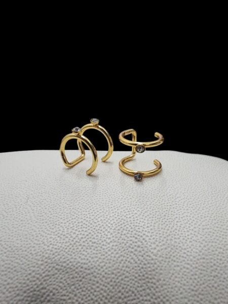 Par de arete de clip de acero con piedritas
